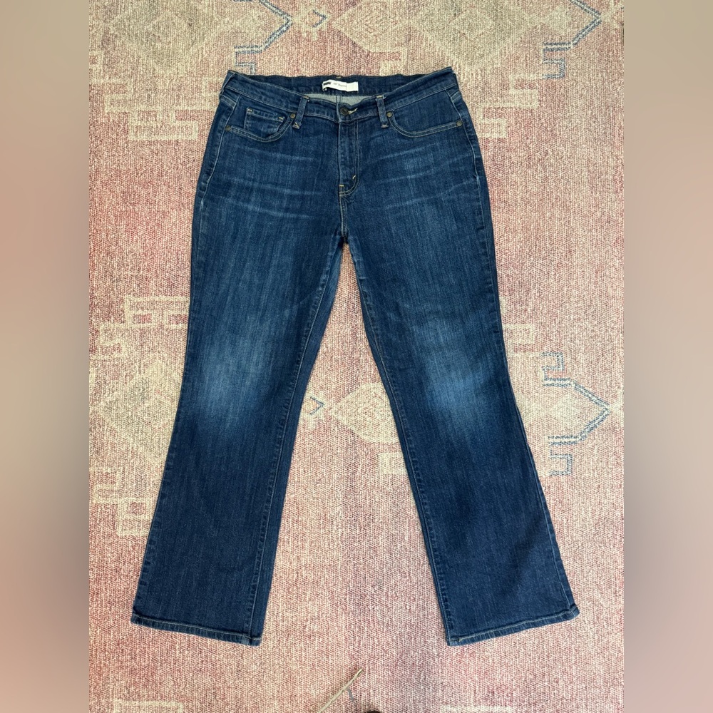 Leviβs 515 bootcut stretch dark wash mid rise flap back pockets size 31 womenβs